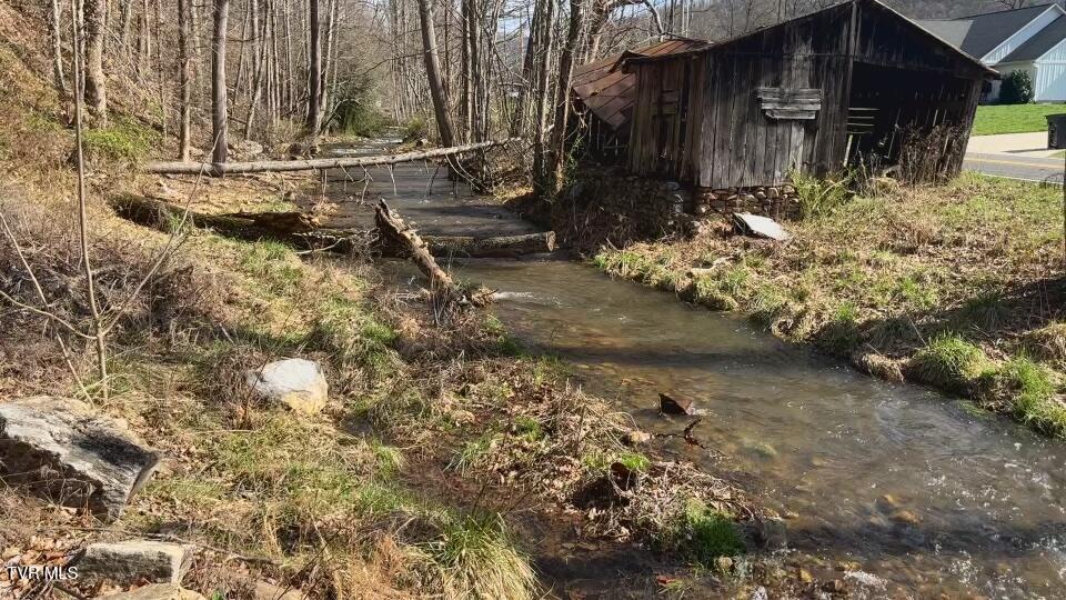 665 Laurels Road Johnson City, TN 37601 - Photo 37 of 43 Creek and barn