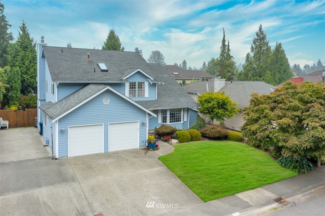 15720 Southeast 184th Street Renton, WA 98058 - Photo 2 of 30 front view of a house with a yard