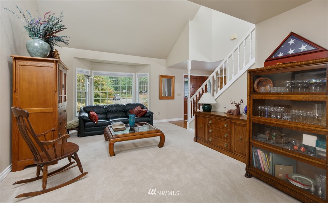 15720 Southeast 184th Street Renton, WA 98058 - Photo 15 of 30 a living room with furniture cabinets and a window