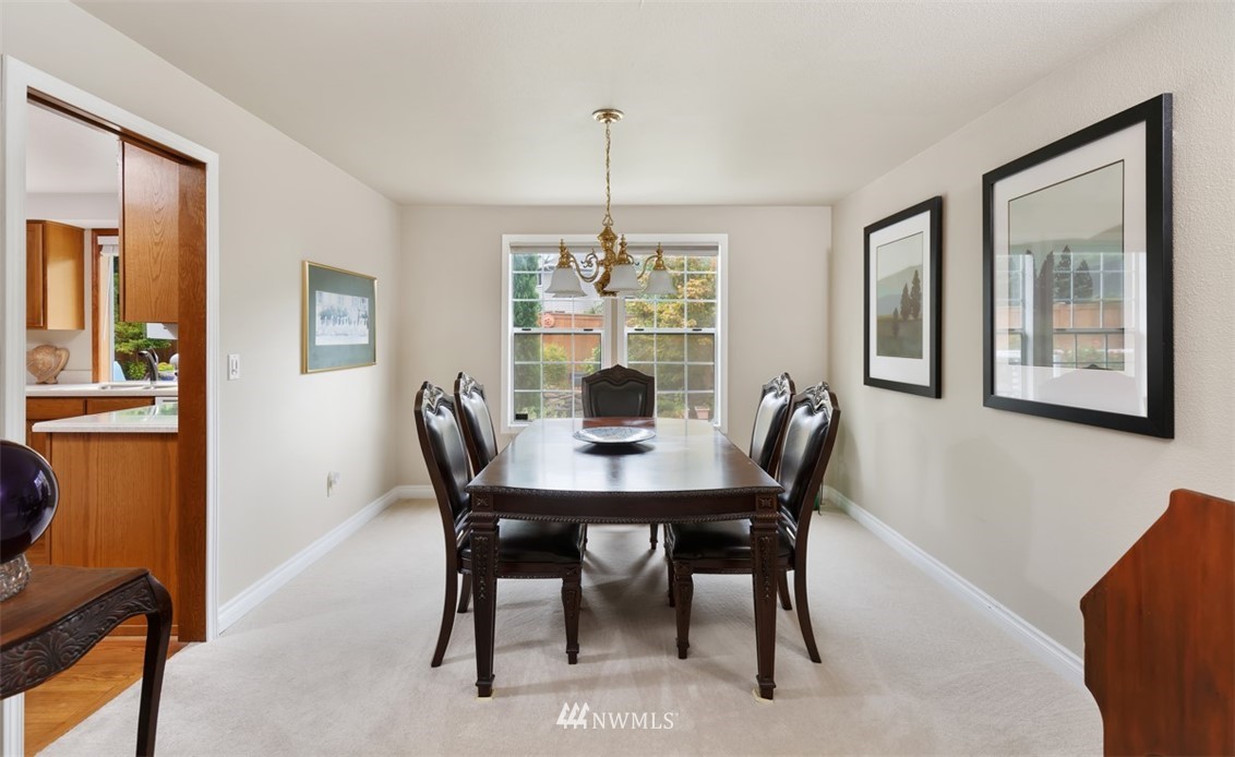 15720 Southeast 184th Street Renton, WA 98058 - Photo 16 of 30 a view of a dining room with furniture window and outside view