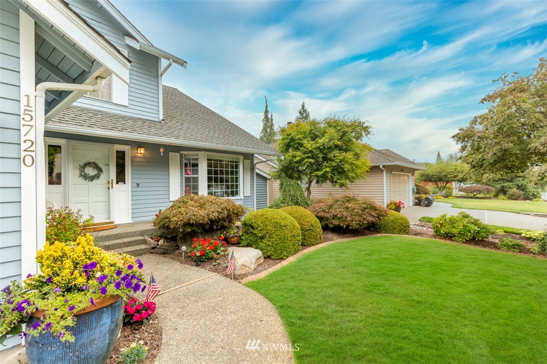15720 Southeast 184th Street Renton, WA 98058 - Photo 3 of 30 a front view of a house with a yard