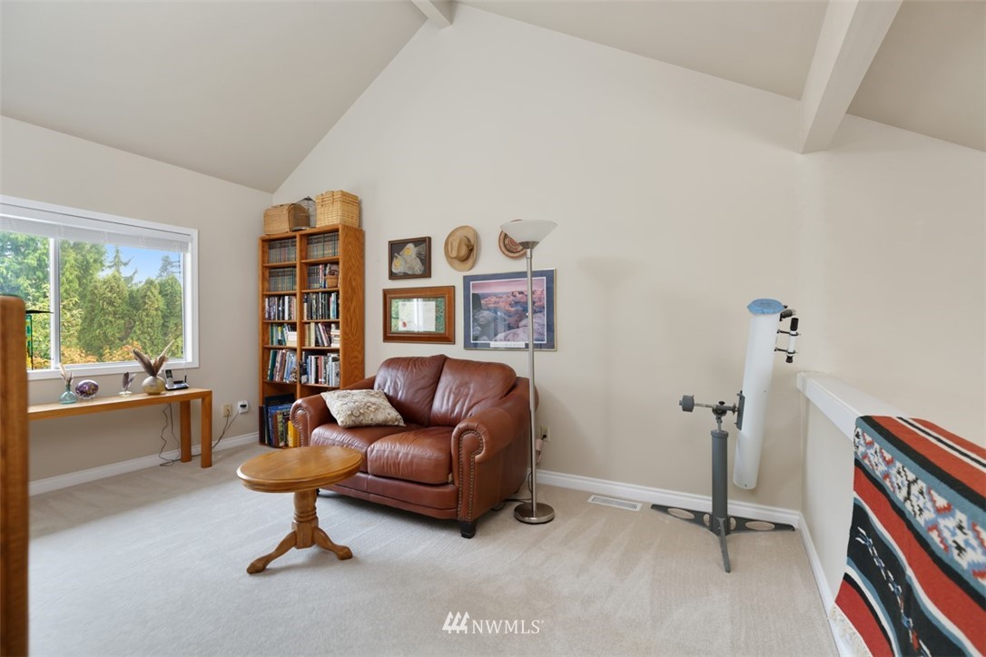 15720 Southeast 184th Street Renton, WA 98058 - Photo 23 of 30 a living room with furniture a piano and a window