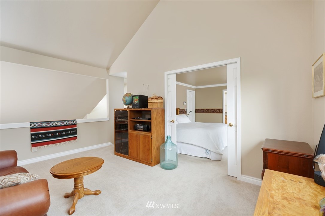15720 Southeast 184th Street Renton, WA 98058 - Photo 24 of 30 a bedroom with furniture and a bathroom