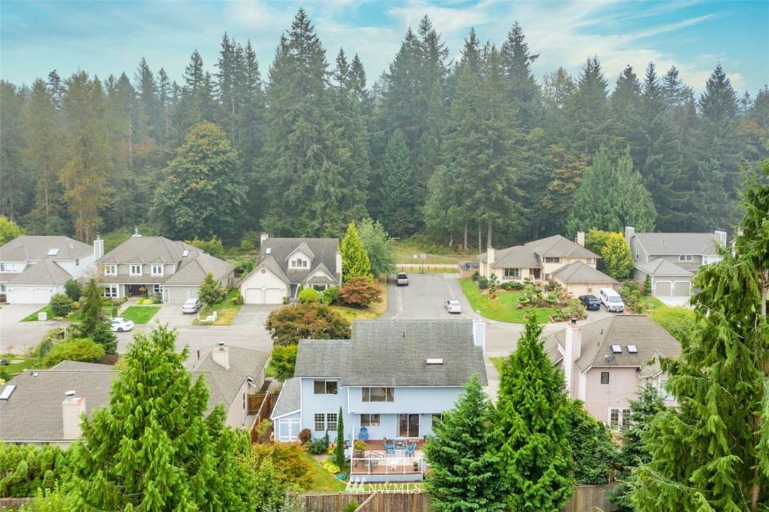 15720 Southeast 184th Street Renton, WA 98058 - Photo 4 of 30 an aerial view of residential houses with outdoor space