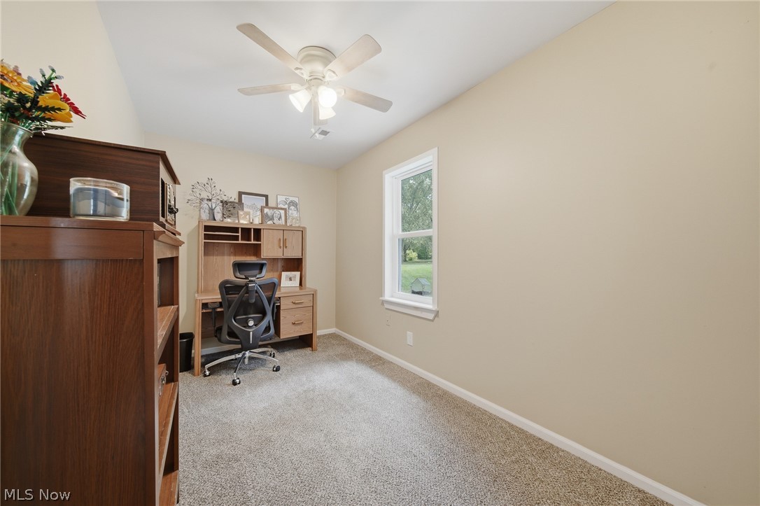 3471 State Rte 5 Newton Falls, OH 44444 - Photo 19 of 31 Carpeted room with a single window and neutral-toned walls