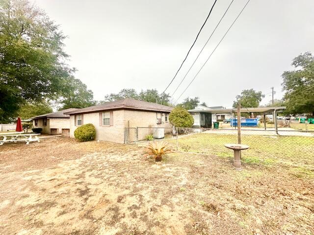 265 Harding Road Niceville, FL 32578 - Photo 21 of 21 Chain link fenced yard