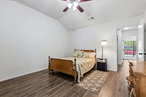 a bed room with a bed and a table