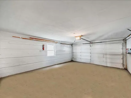 a bedroom with a bed and ceiling fan