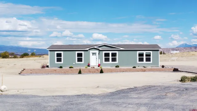 a view of a house with a sitting space