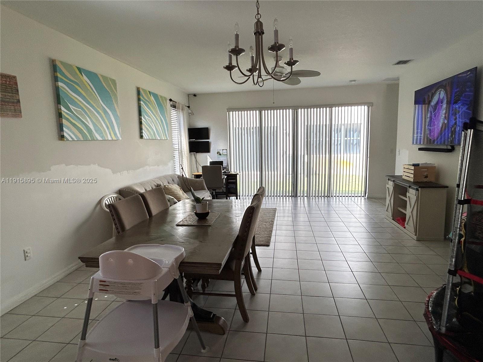 5518 Useppa Drive Immokalee, FL 34142 - Photo 1 of 13 a view of a livingroom with furniture and window