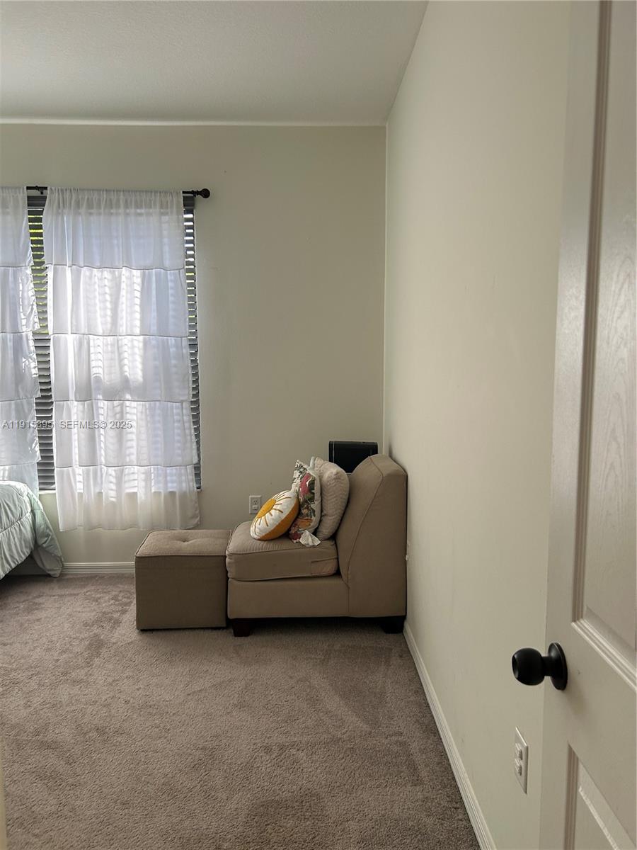 5518 Useppa Drive Immokalee, FL 34142 - Photo 8 of 14 a living room with furniture and a window