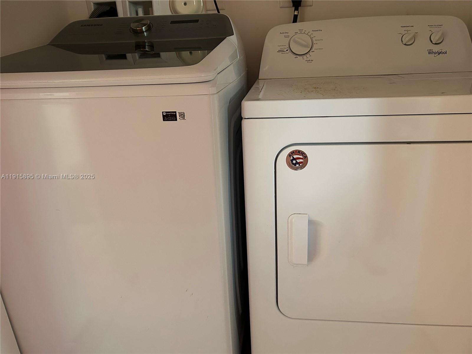 5518 Useppa Drive Immokalee, FL 34142 - Photo 9 of 14 a close view of a sink and washer dryer