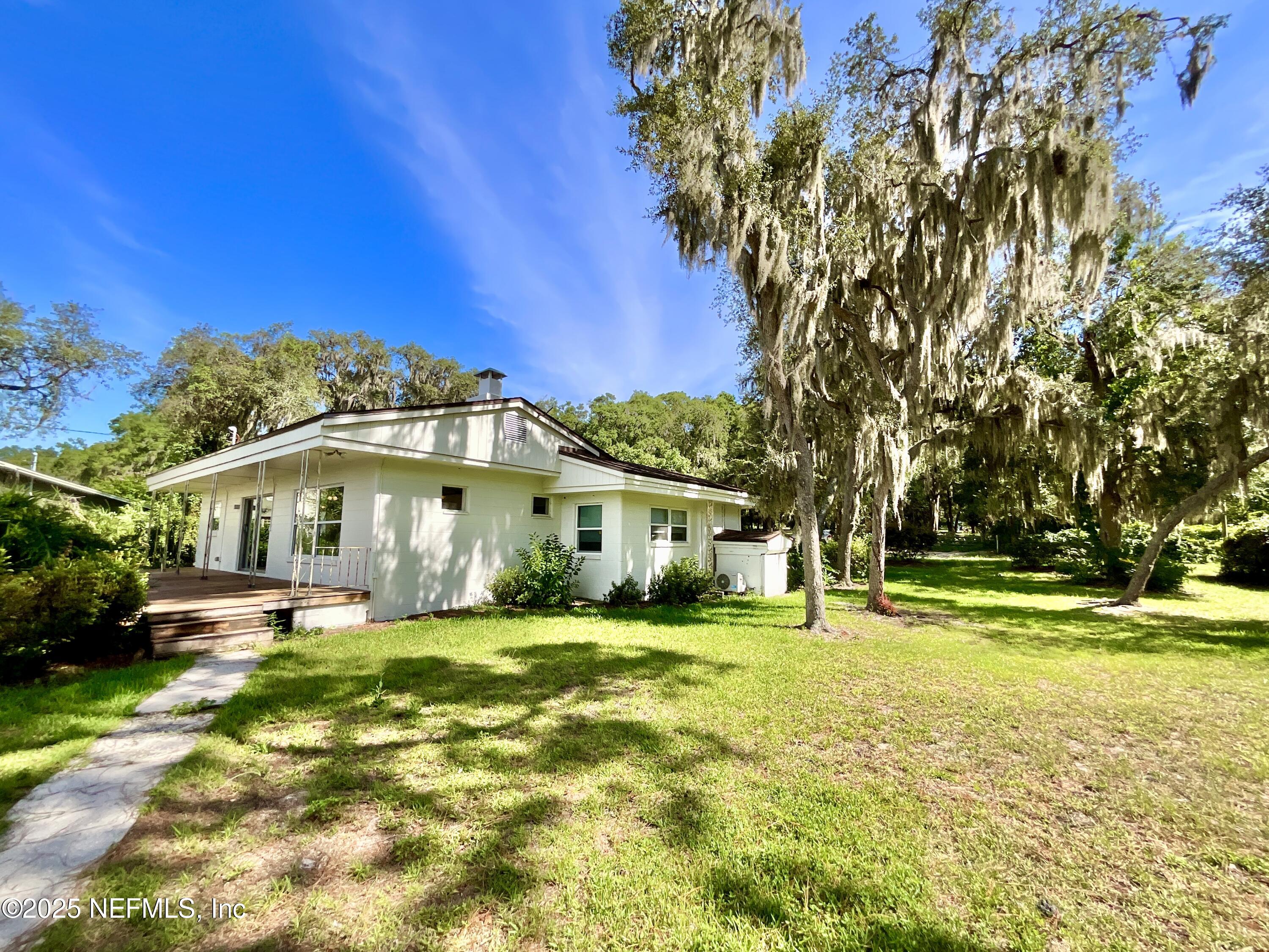 145 Depot Road Hawthorne, FL 32640 - Photo 11 of 73 a view of a house with a big yard