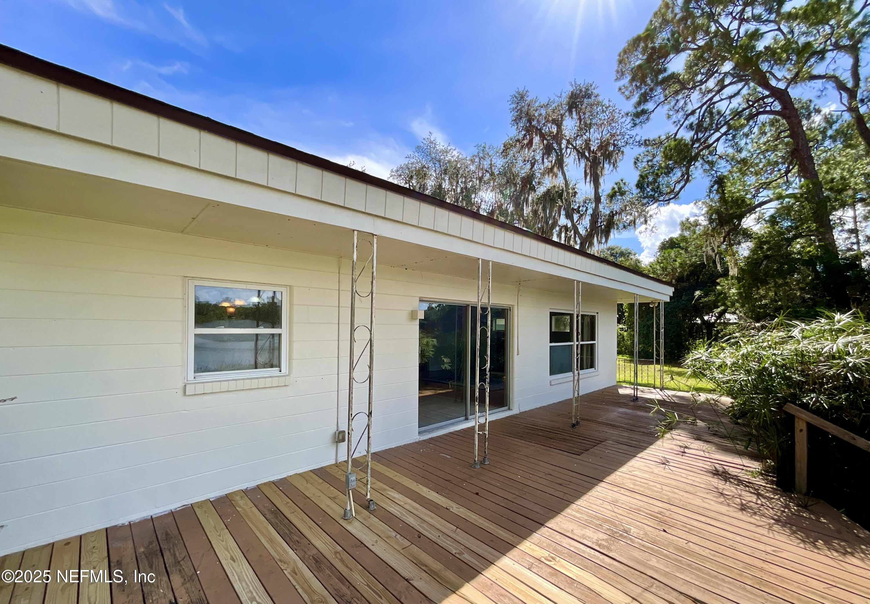145 Depot Road Hawthorne, FL 32640 - Photo 40 of 73 a view of a house with a backyard