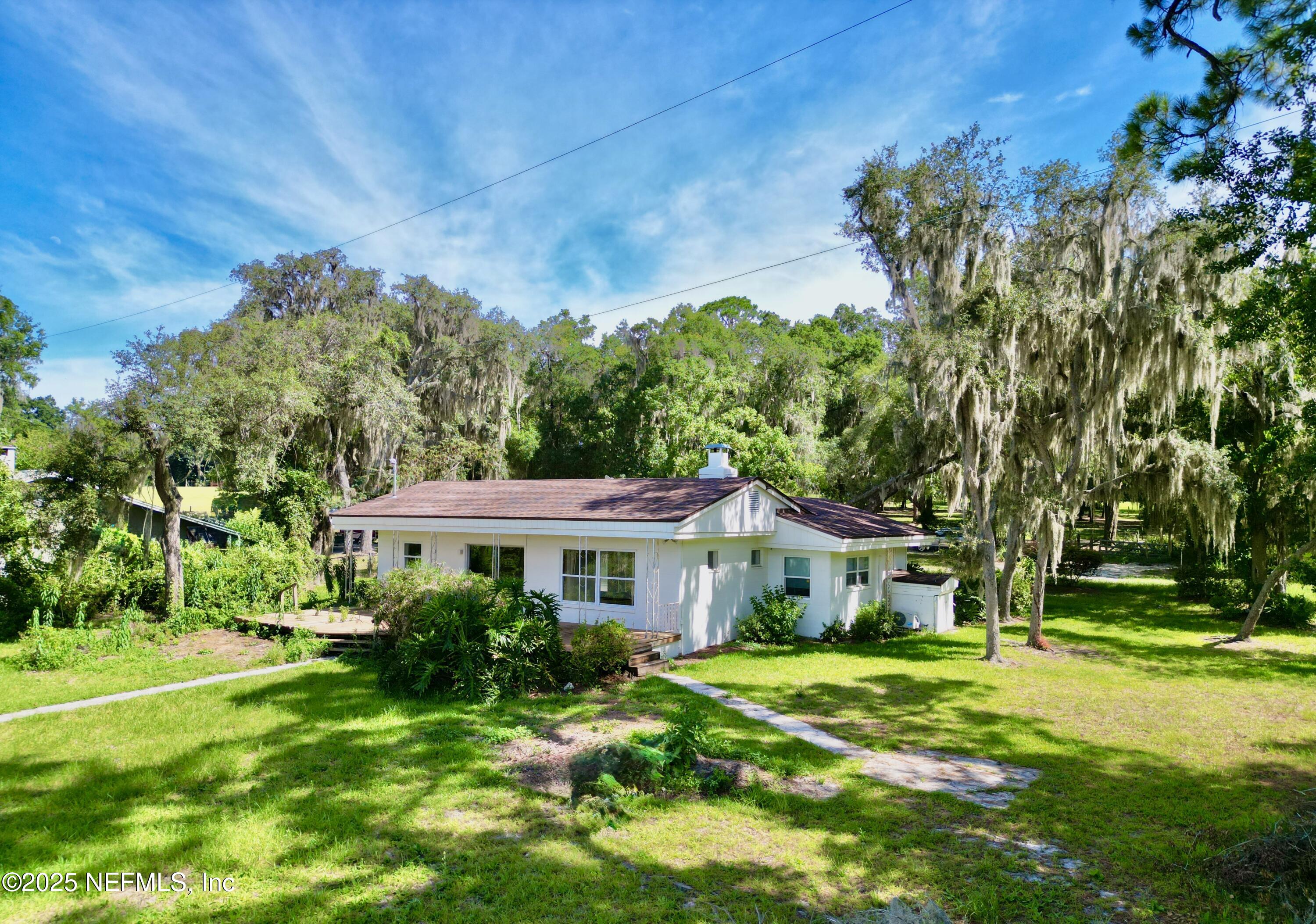 145 Depot Road Hawthorne, FL 32640 - Photo 53 of 73 a front view of a house with a yard