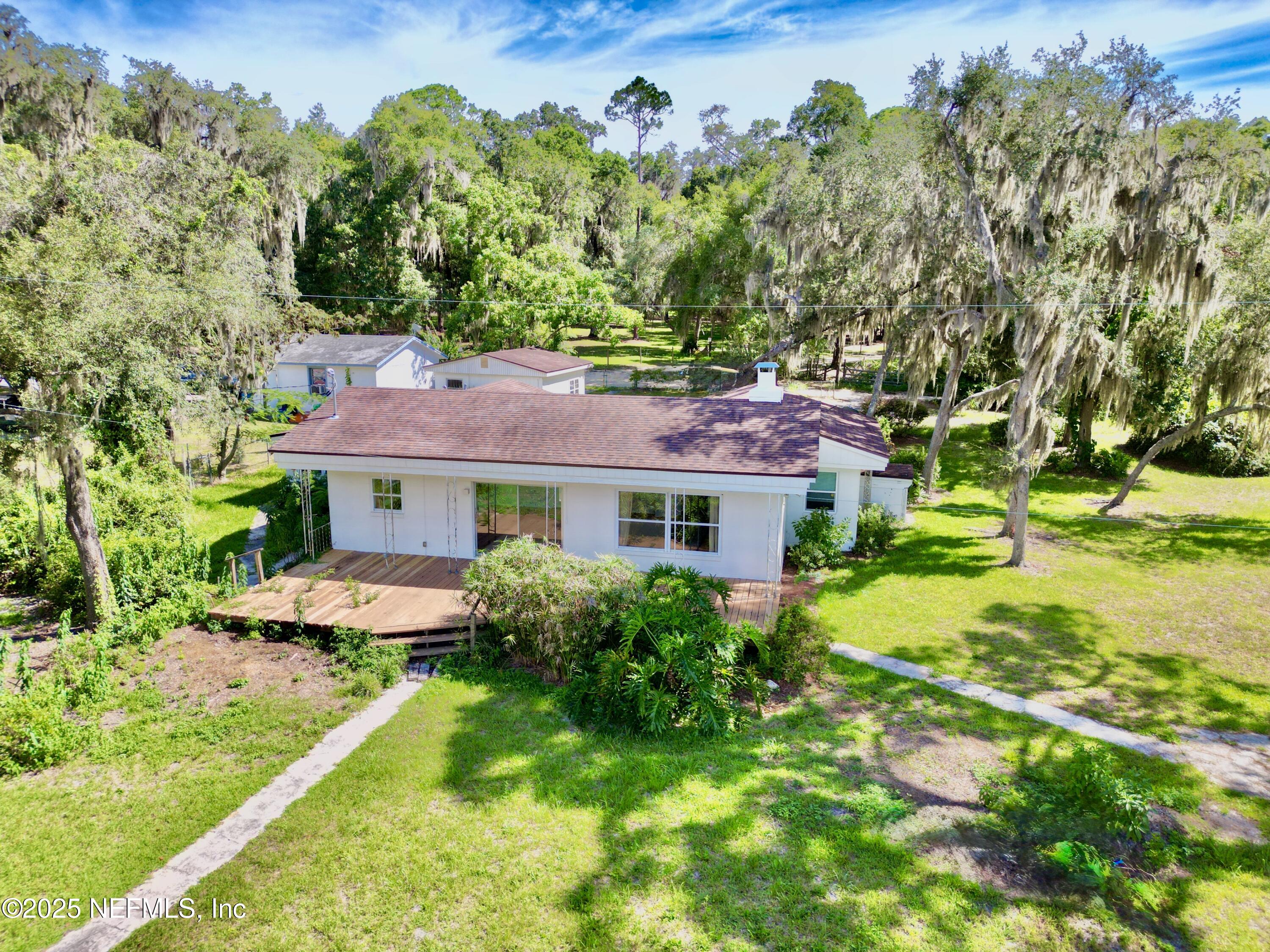 145 Depot Road Hawthorne, FL 32640 - Photo 55 of 73 a view of a house with a big yard