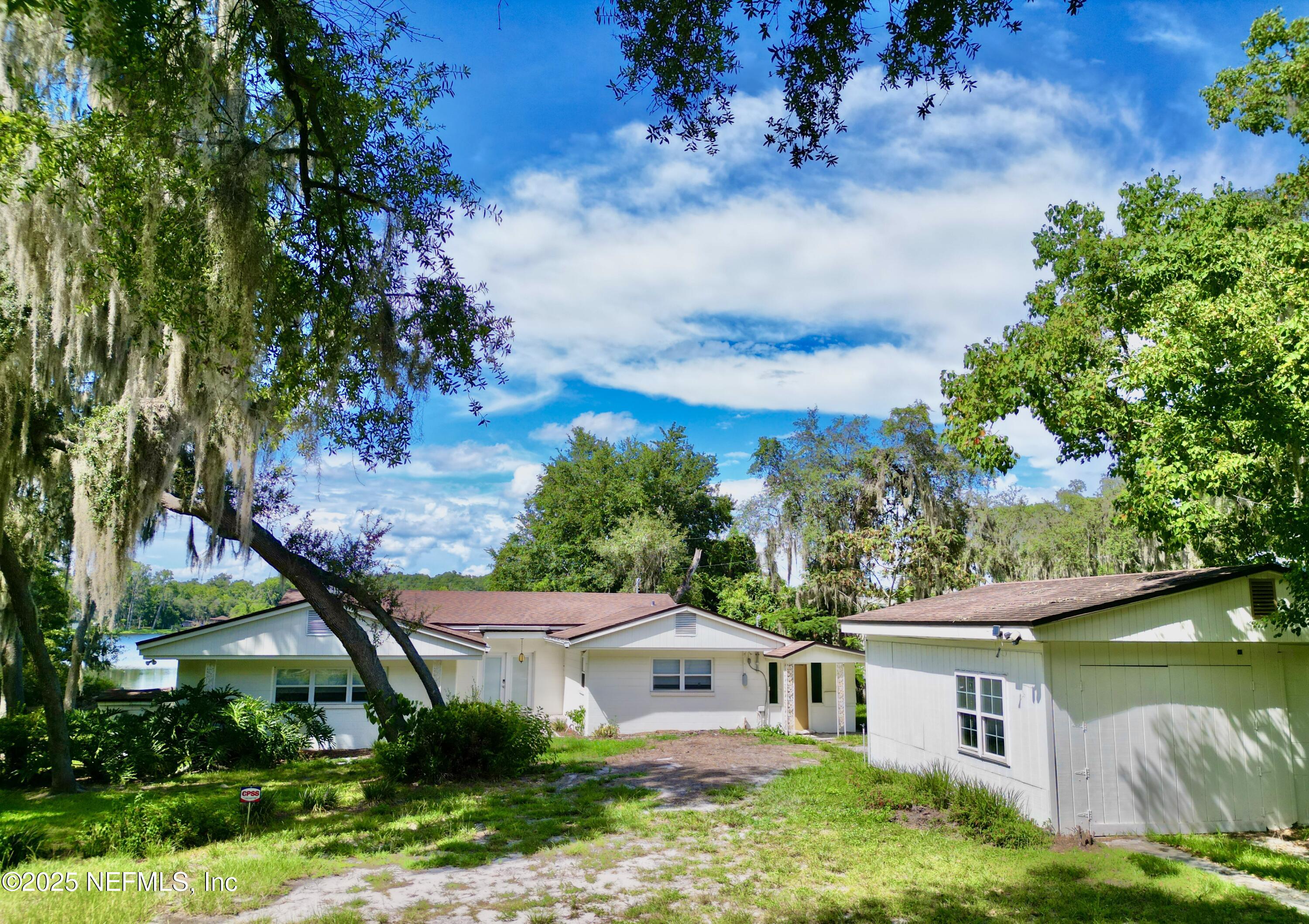 145 Depot Road Hawthorne, FL 32640 - Photo 61 of 73 a view of a house with a yard