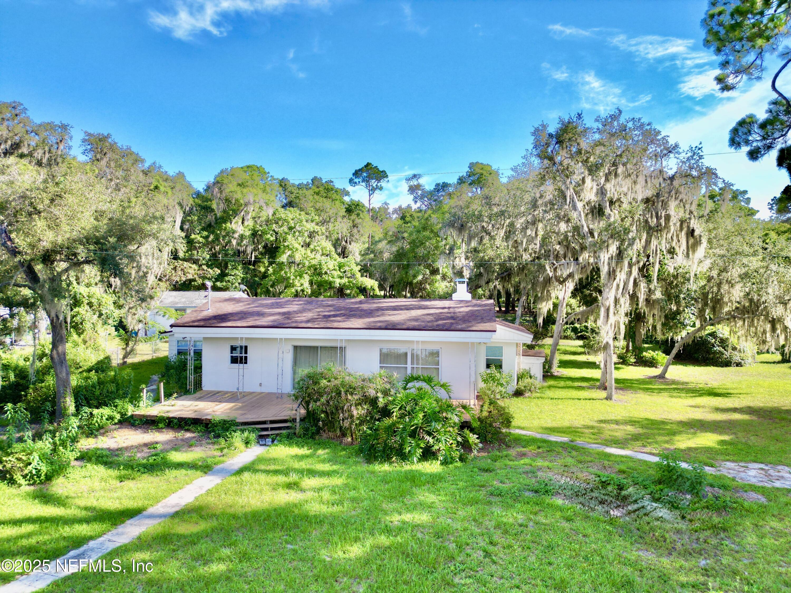 145 Depot Road Hawthorne, FL 32640 - Photo 62 of 73 a view of a house with a yard