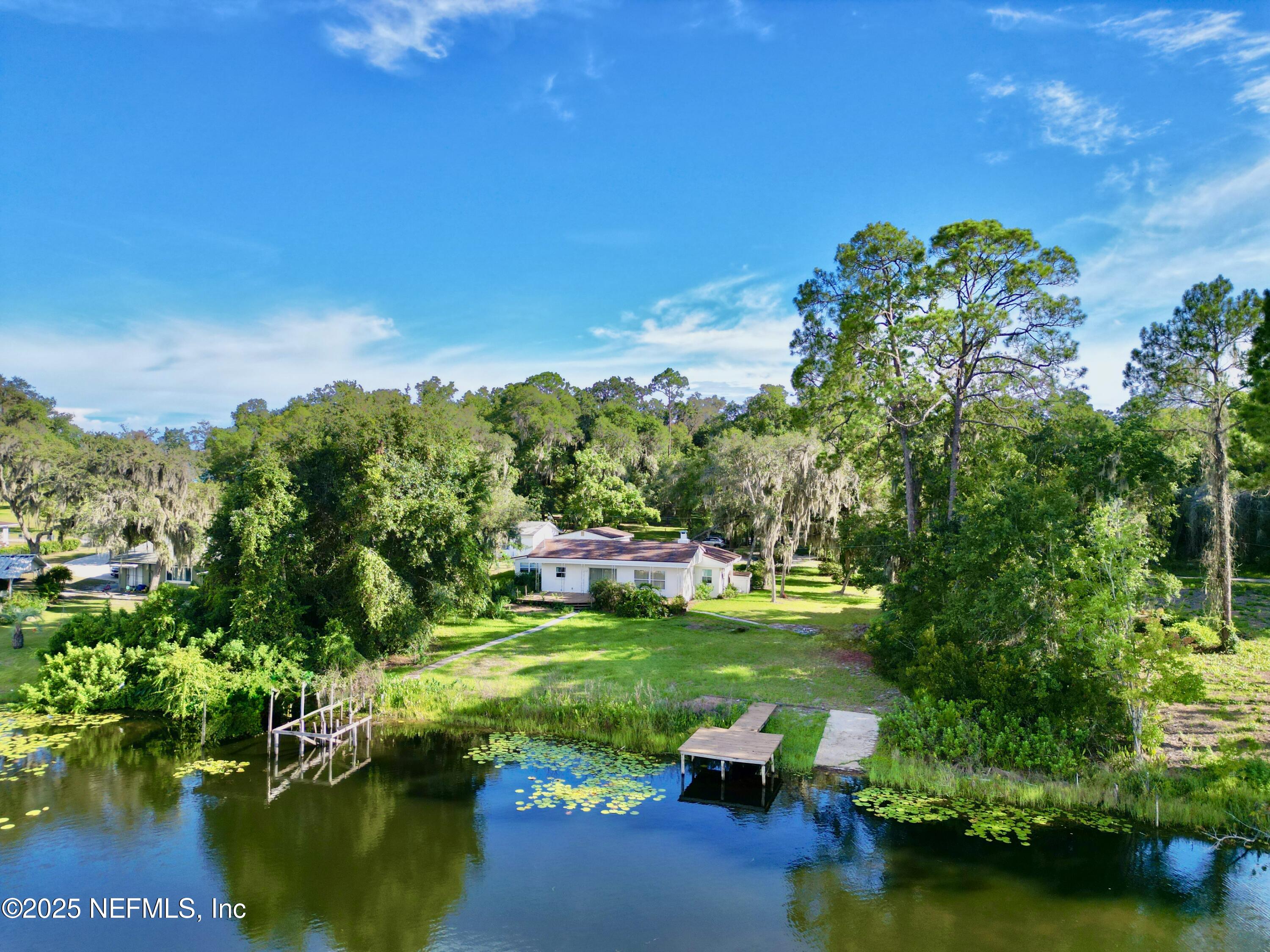 145 Depot Road Hawthorne, FL 32640 - Photo 66 of 73 a view of a lake with houses