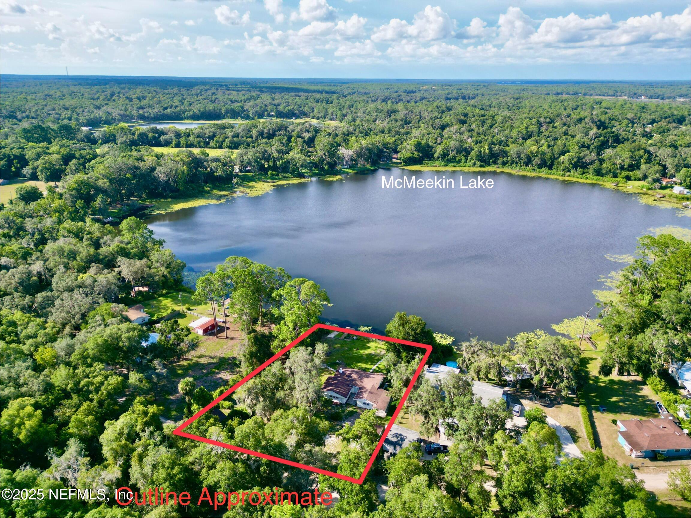 145 Depot Road Hawthorne, FL 32640 - Photo 71 of 73 an aerial view of a house with a yard and lake view