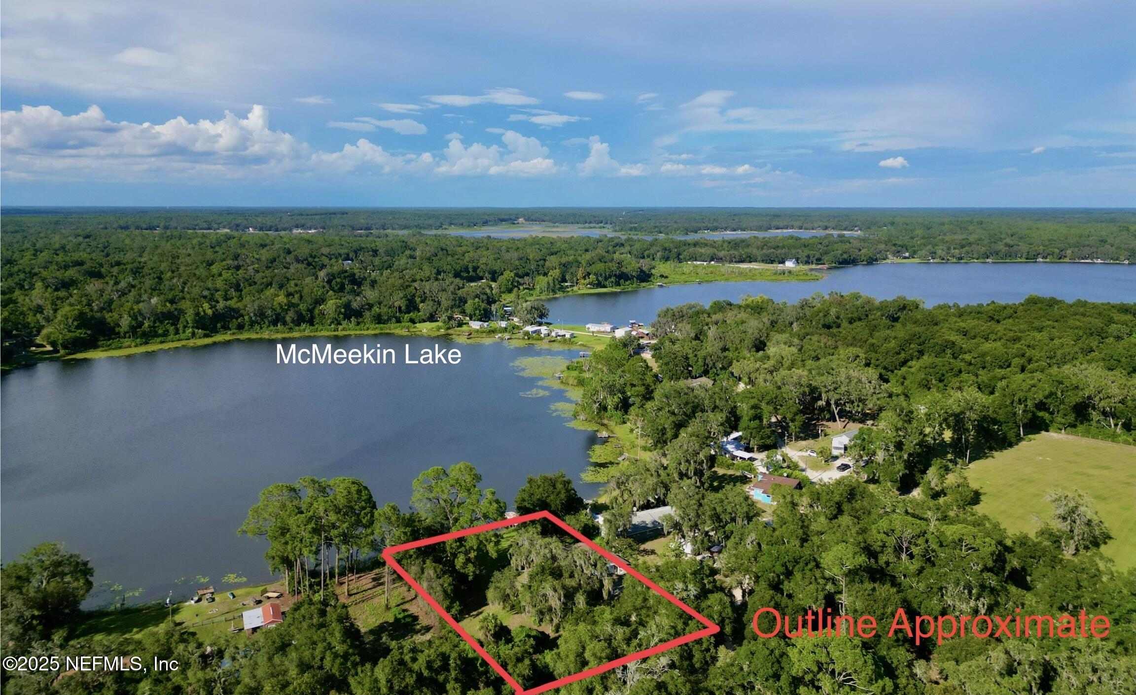 145 Depot Road Hawthorne, FL 32640 - Photo 72 of 73 a view of a lake with a city view