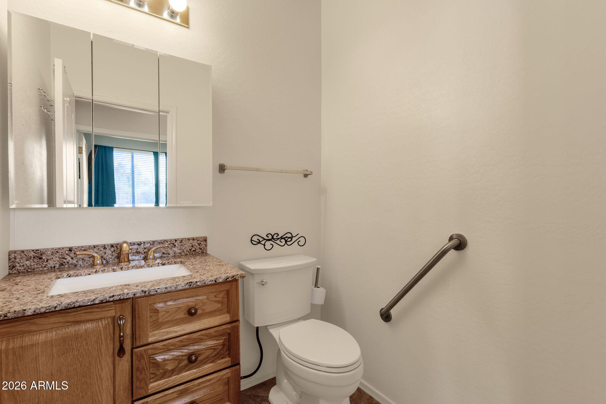 3334 East Hopkins Road Gilbert, AZ 85295 - Photo 35 of 61 Half Bath across from Den/Study