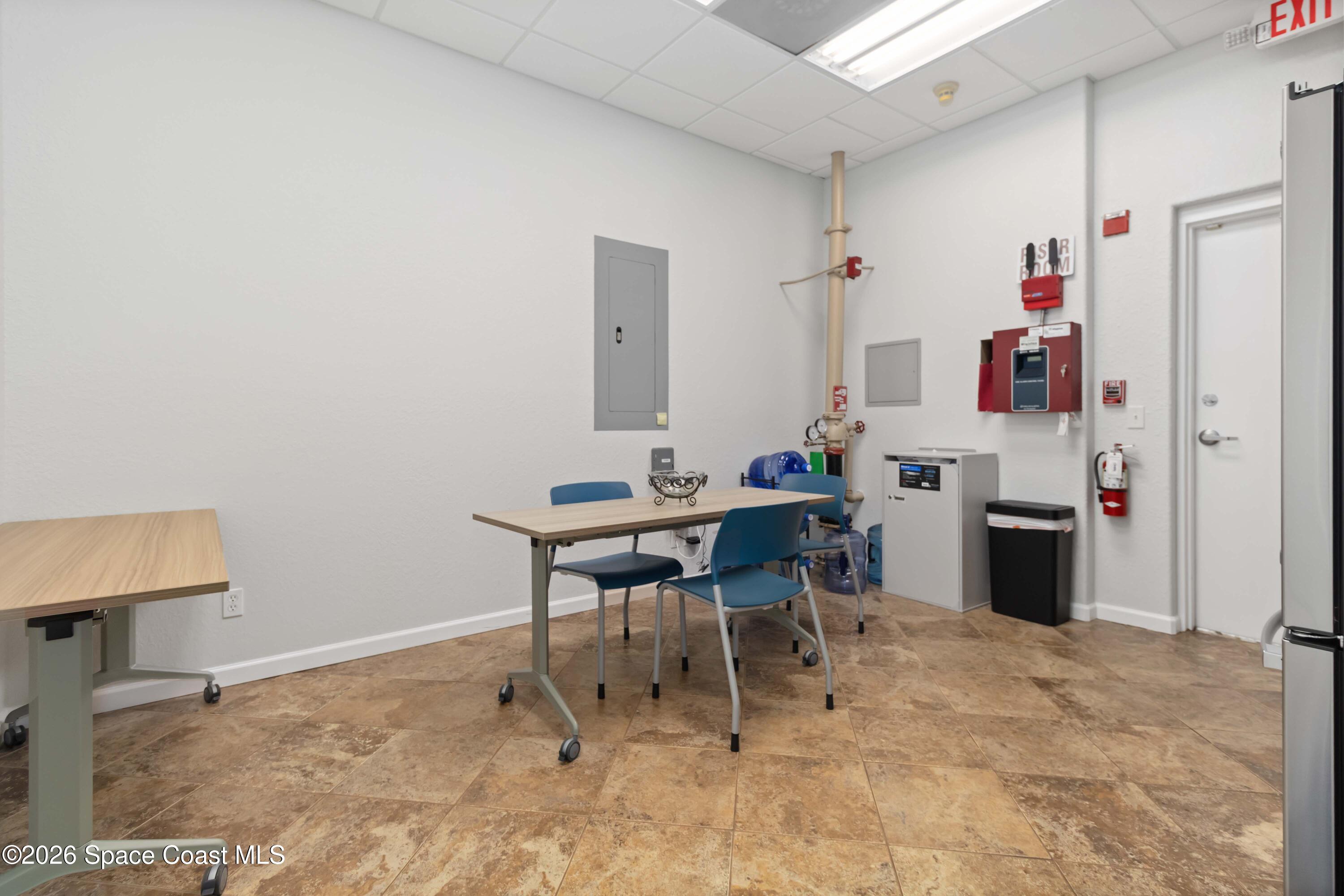 7730 North Wickham Road, Unit 101 Melbourne, FL 32940 - Photo 43 of 48 a workspace with furniture