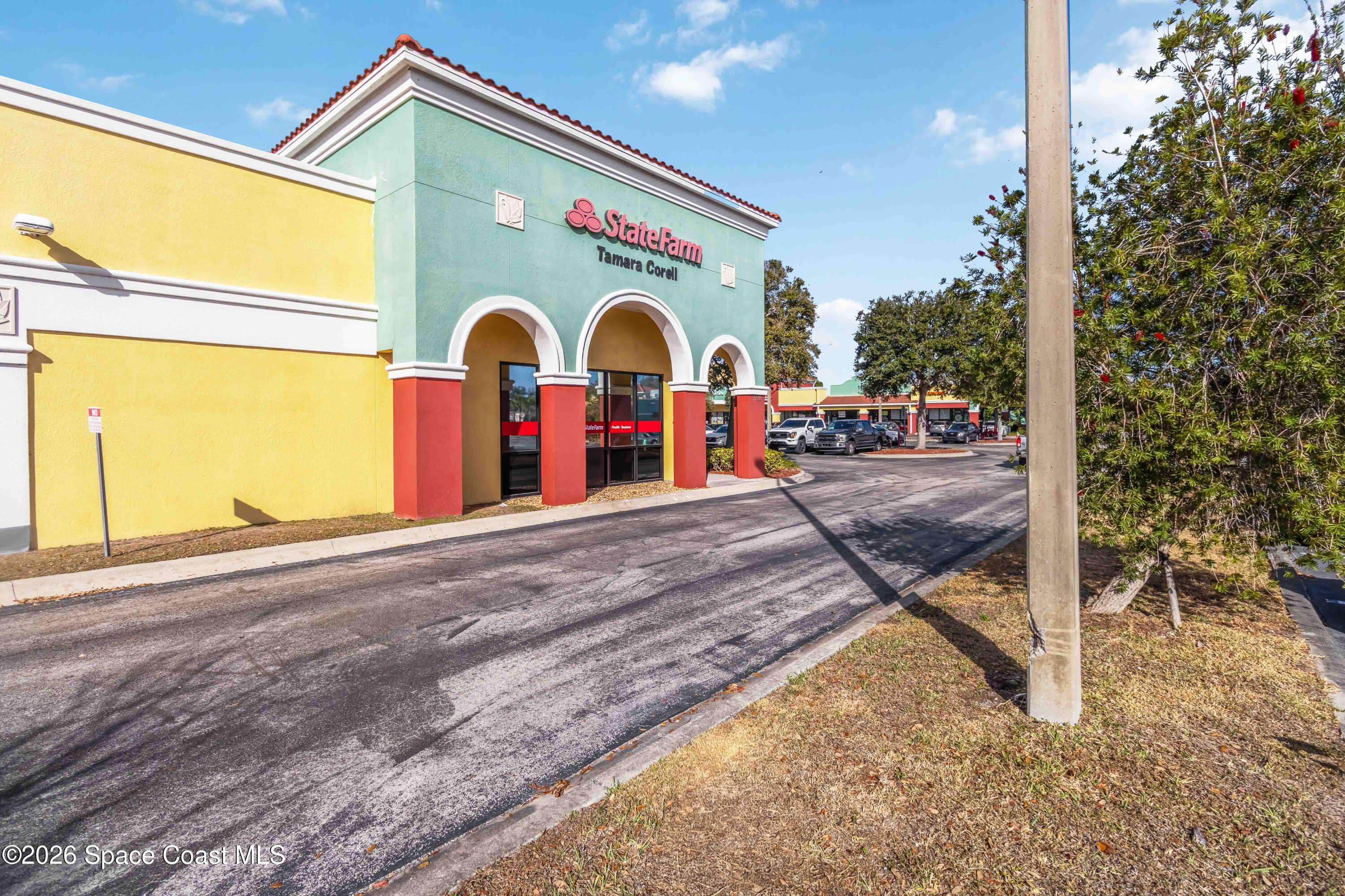 7730 North Wickham Road, Unit 101 Melbourne, FL 32940 - Photo 5 of 48 a view of an outdoor space