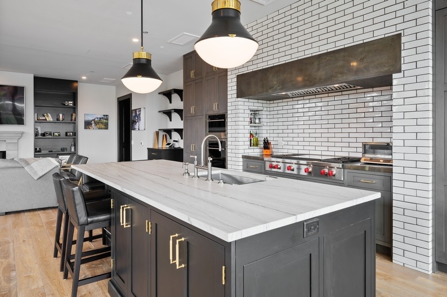 1109 West Washington Boulevard, Unit 4D Chicago, IL 60607 - Photo 10 of 31 a kitchen with a table and chairs