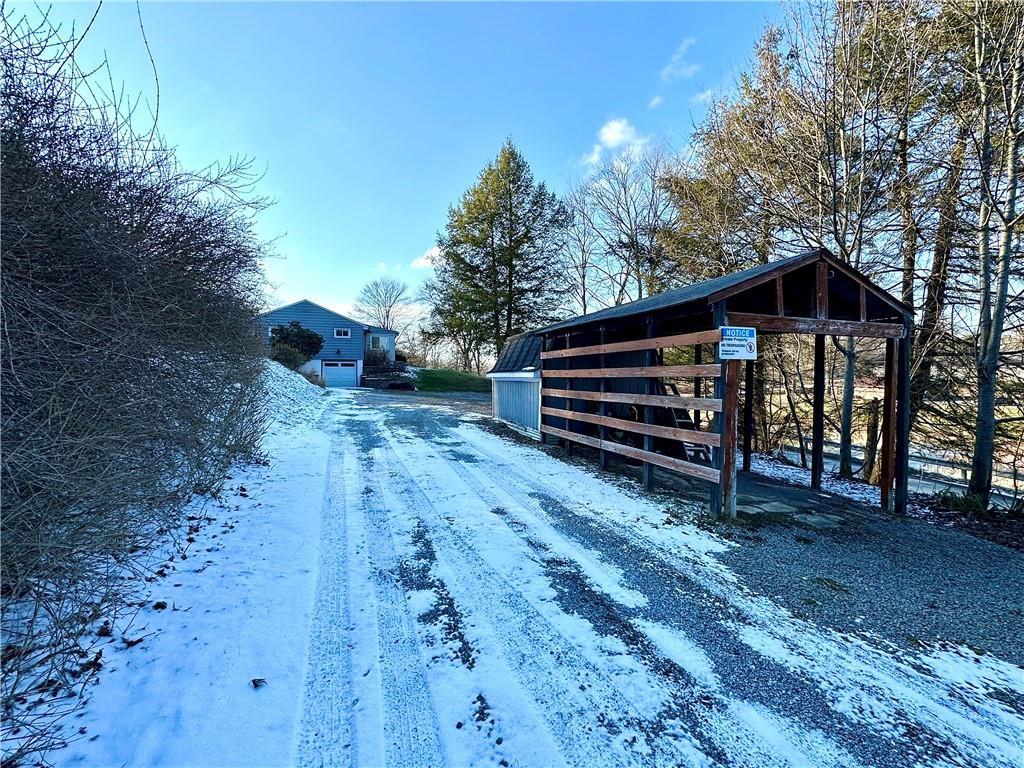 118 Foster Road Beaver Falls, PA 15010 - Photo 20 of 41 a view of a wooden bench sitting in middle of a yard