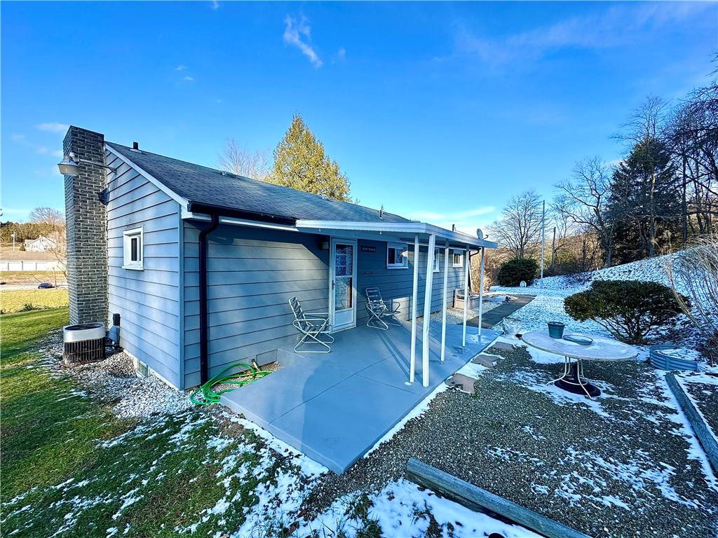 118 Foster Road Beaver Falls, PA 15010 - Photo 2 of 41 a front view of a house with garden