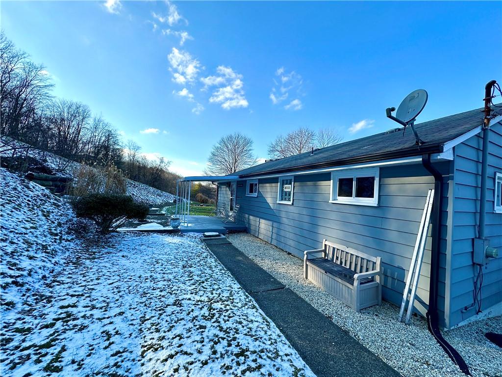118 Foster Road Beaver Falls, PA 15010 - Photo 3 of 41 a view of a house with a patio