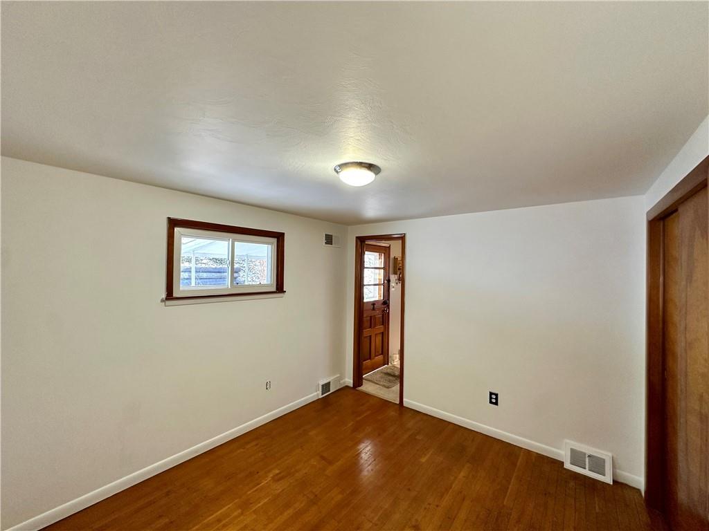 118 Foster Road Beaver Falls, PA 15010 - Photo 32 of 41 an empty room with a empty space and window