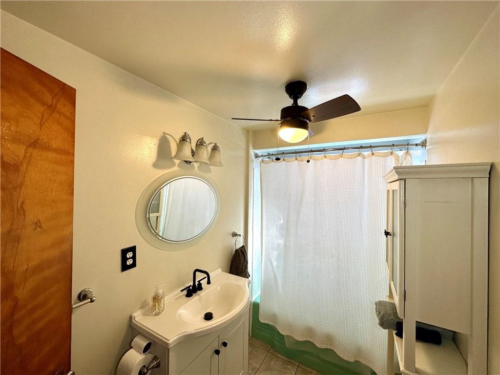 118 Foster Road Beaver Falls, PA 15010 - Photo 35 of 41 a bathroom with a sink and a mirror