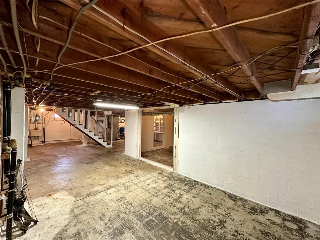 118 Foster Road Beaver Falls, PA 15010 - Photo 39 of 41 a view of hallway with wooden walls