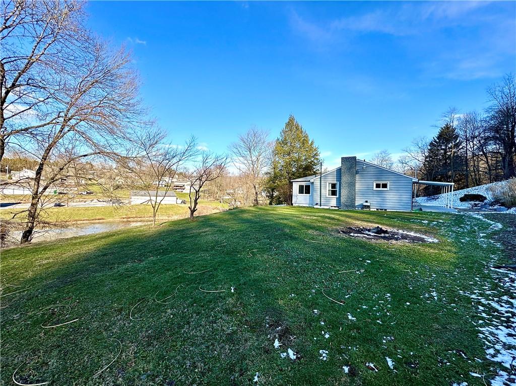 118 Foster Road Beaver Falls, PA 15010 - Photo 5 of 41 a house view with swimming pool in front of it