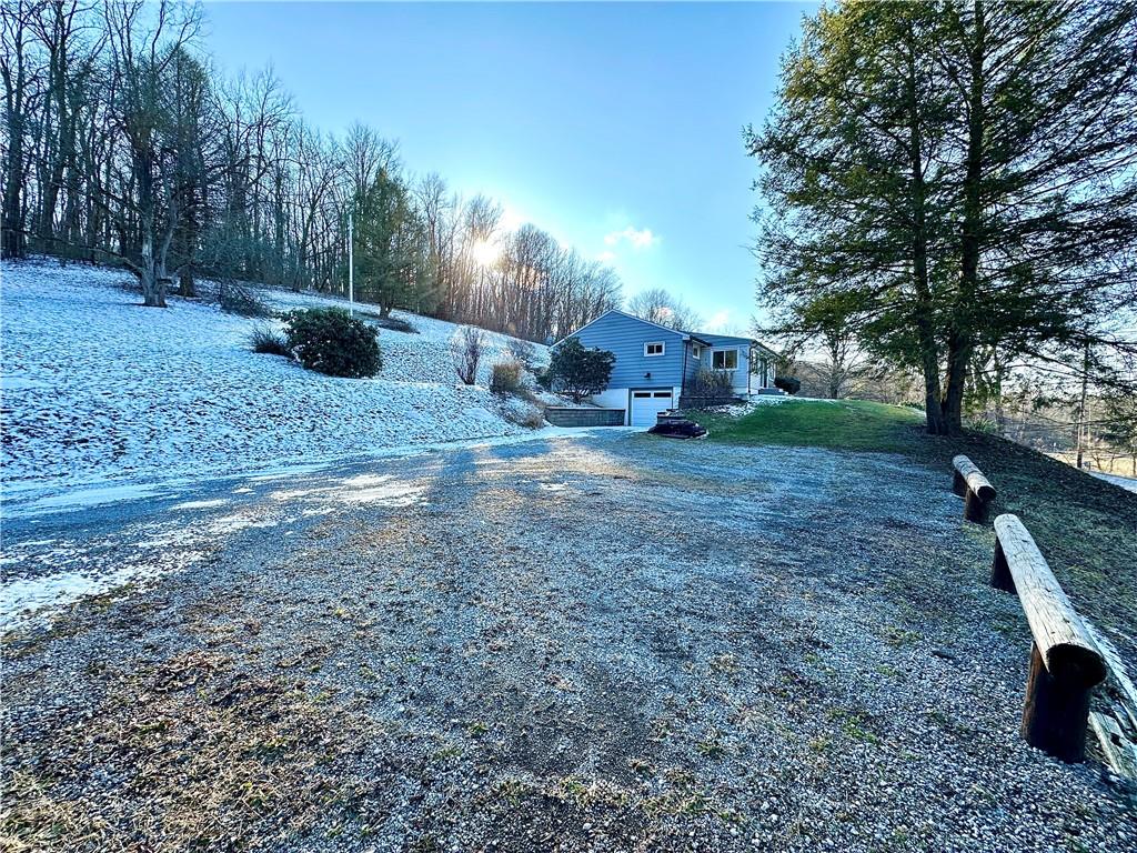 118 Foster Road Beaver Falls, PA 15010 - Photo 7 of 41 a view of a yard with a tree