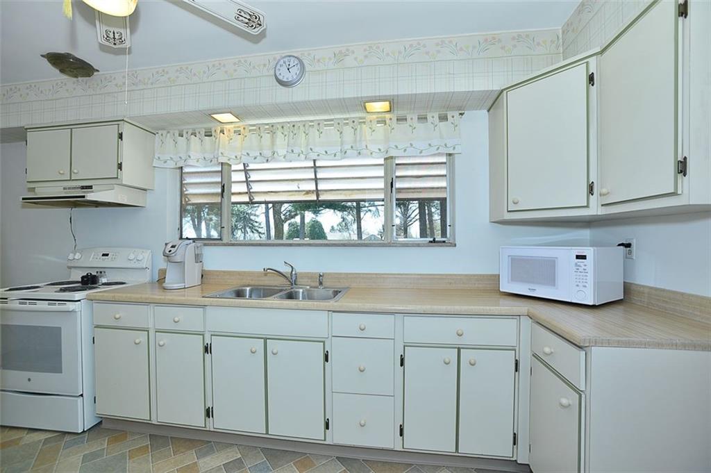 280 Pine Road Pittsburgh, PA 15237 - Photo 3 of 14 Kitchen with large windows overlooking the yard.