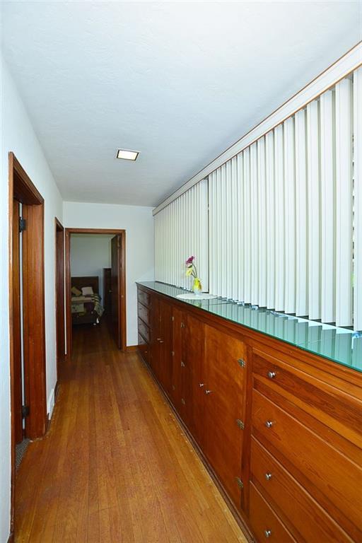 280 Pine Road Pittsburgh, PA 15237 - Photo 7 of 14 Hallway with hardwood floors, built in's and lined with windows!