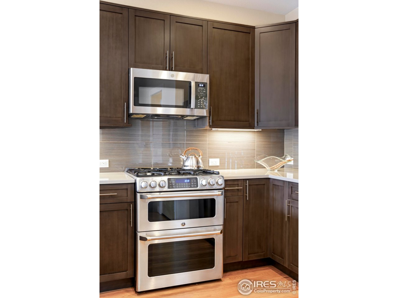 5315 5th Street, Unit A Boulder, CO 80304 - Photo 12 of 32 a kitchen with a stove and a microwave