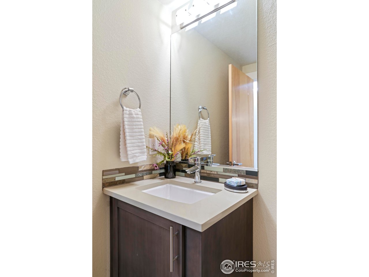 5315 5th Street, Unit A Boulder, CO 80304 - Photo 13 of 32 a bathroom with a sink and a mirror