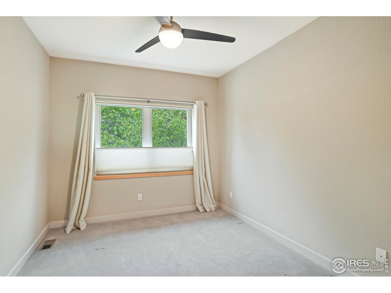 5315 5th Street, Unit A Boulder, CO 80304 - Photo 14 of 32 a view of an empty room and a window