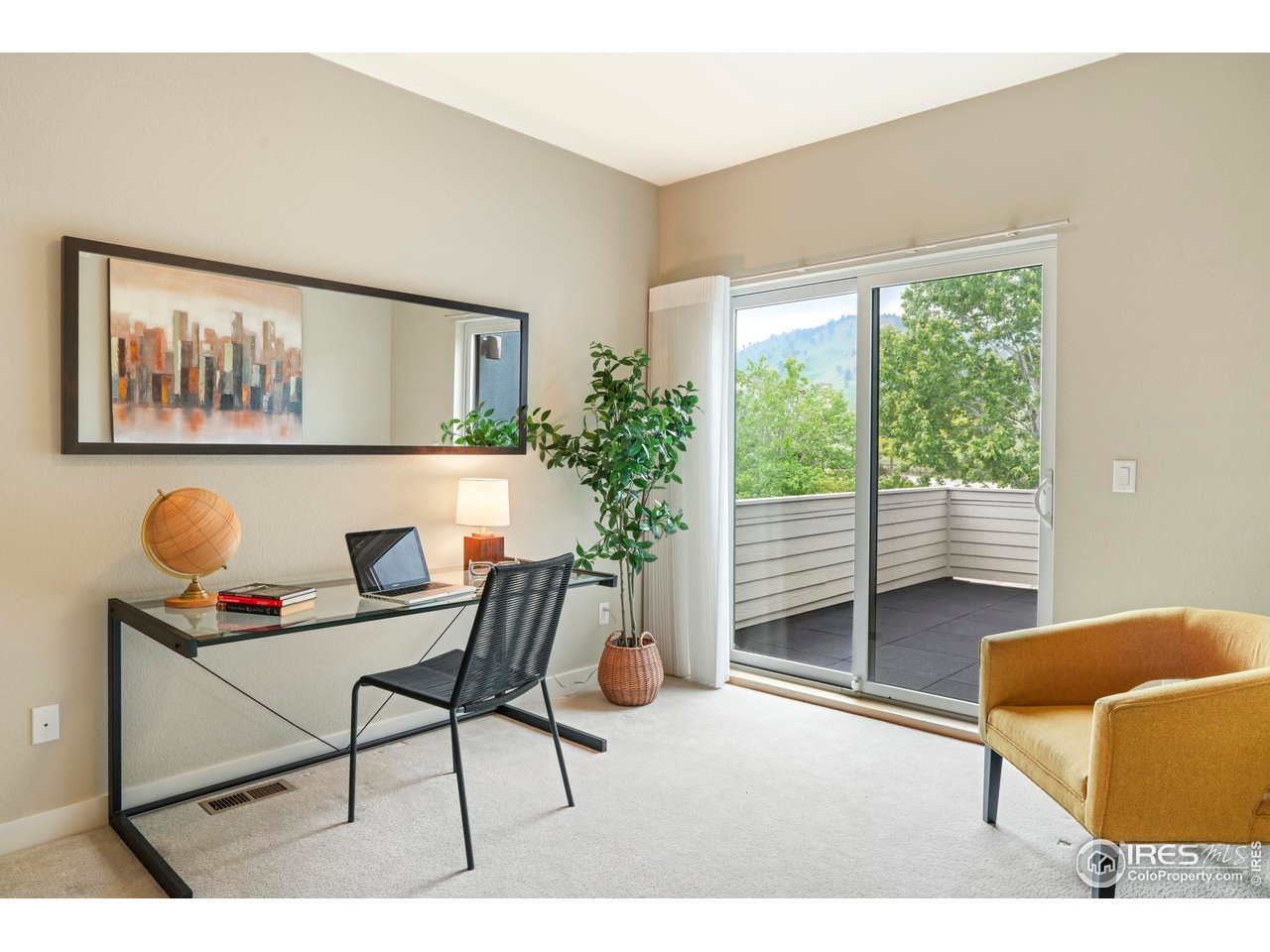 5315 5th Street, Unit A Boulder, CO 80304 - Photo 16 of 32 a living room with furniture and a large window