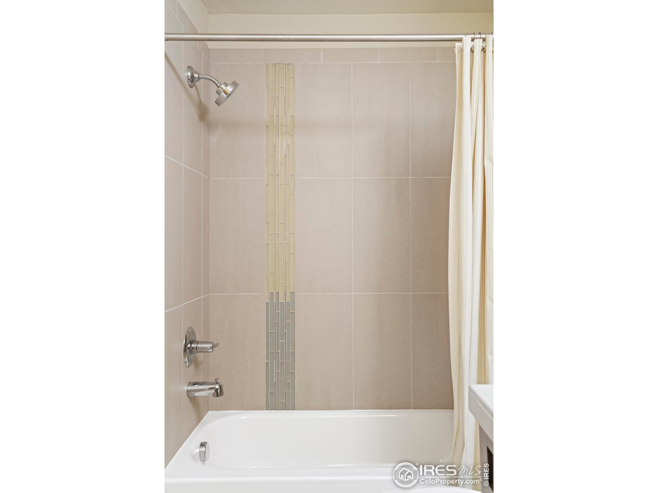 5315 5th Street, Unit A Boulder, CO 80304 - Photo 19 of 32 a bathroom with a shower and a bath tub