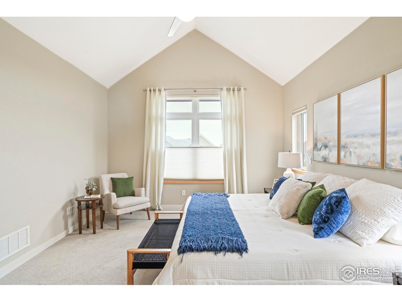 5315 5th Street, Unit A Boulder, CO 80304 - Photo 20 of 32 a living room with a bed furniture and a large window