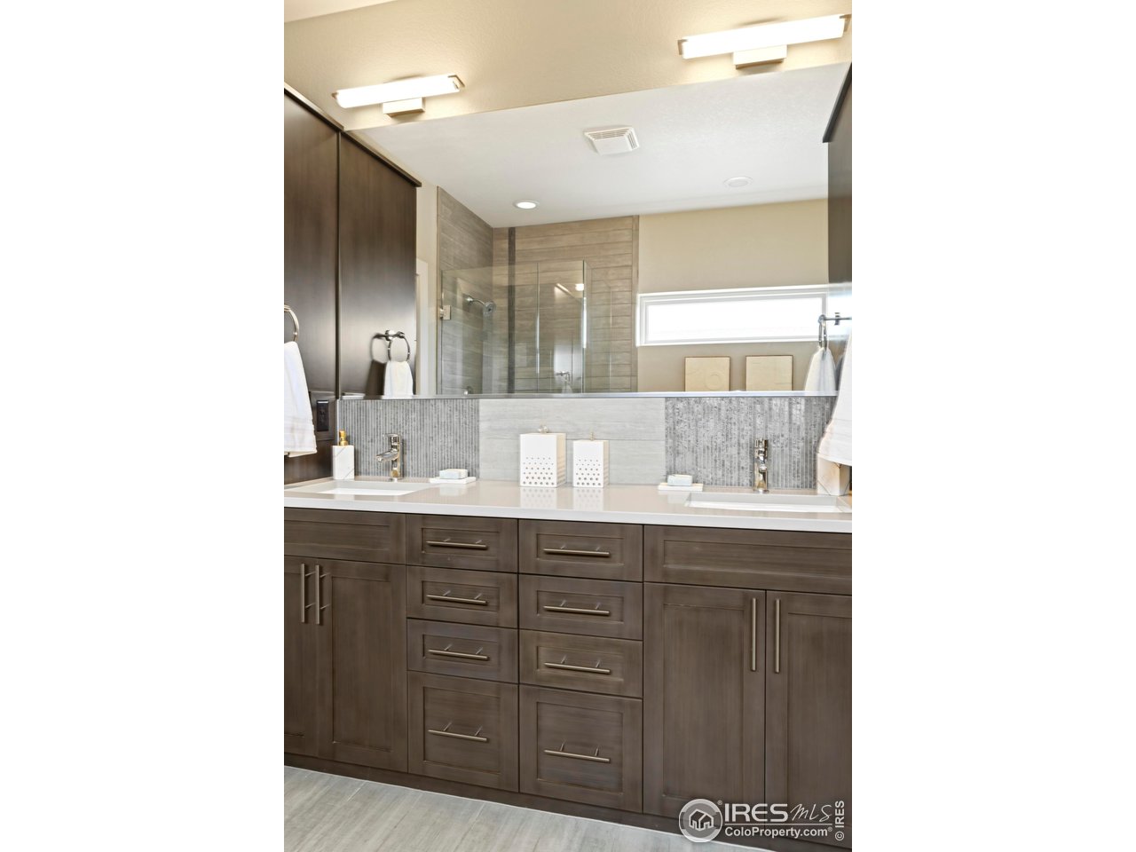 5315 5th Street, Unit A Boulder, CO 80304 - Photo 24 of 32 a bathroom with a double vanity sink and mirror
