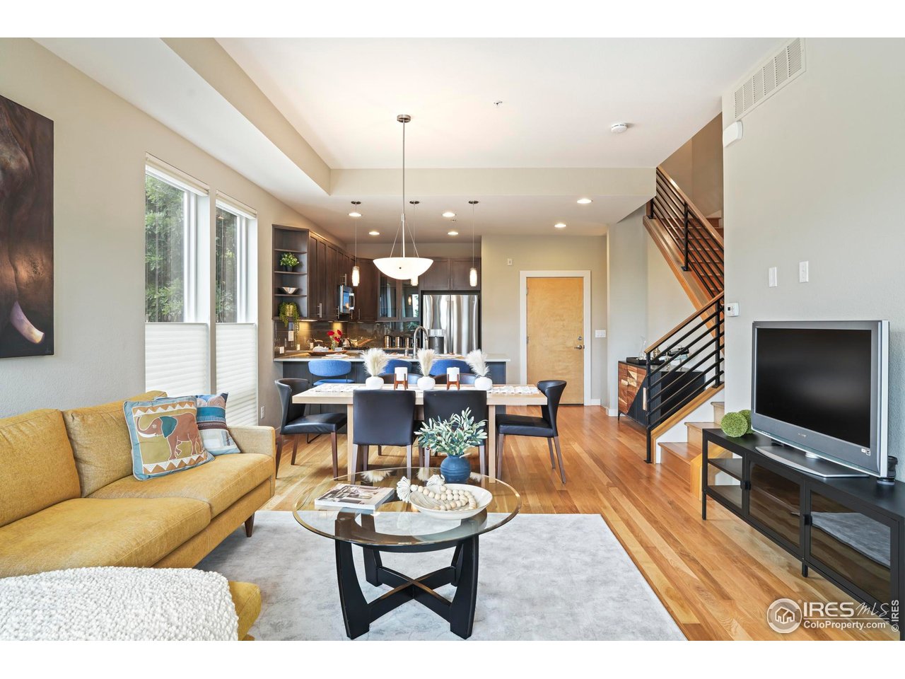 5315 5th Street, Unit A Boulder, CO 80304 - Photo 4 of 32 a living room with furniture and a flat screen tv