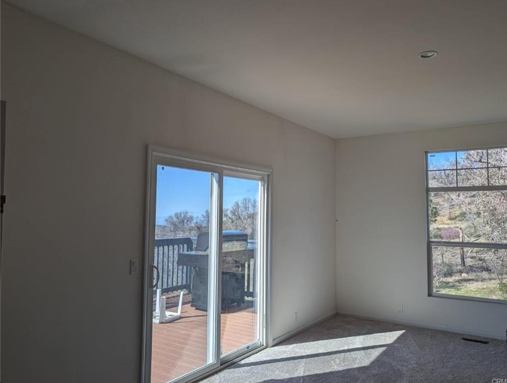 709 Encina Grande Road Berry Creek, CA 95916 - Photo 6 of 12 a view of an empty room with a window