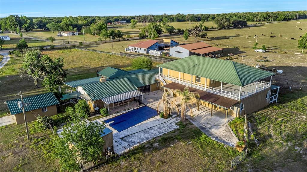 20138 Bowman Road Spring Hill, FL 34610 - Photo 5 of 40 an aerial view of a house with outdoor space