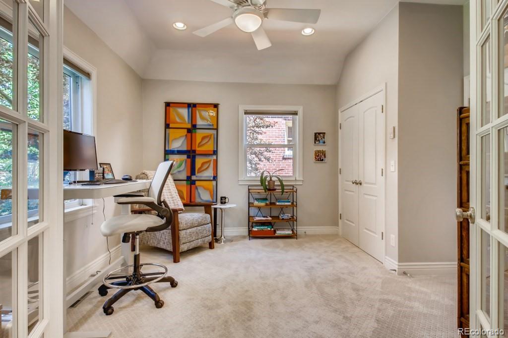3234 Stuart Street Denver, CO 80212 - Photo 11 of 40 a view of a livingroom with gym equipment